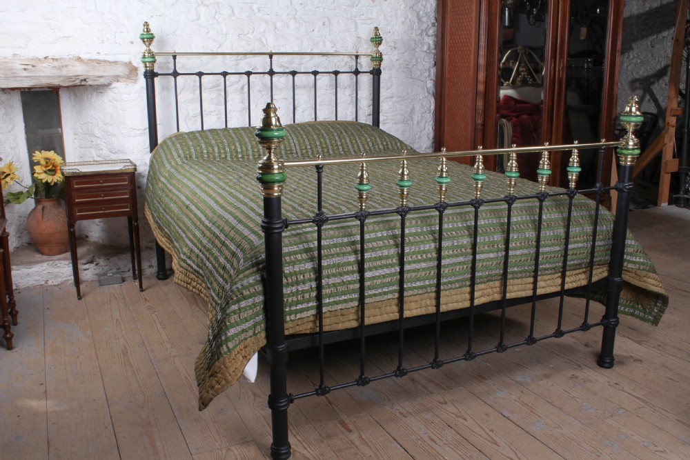 Unique and Captivating Iron and Brass King size Bed with Porcelain Detail. 