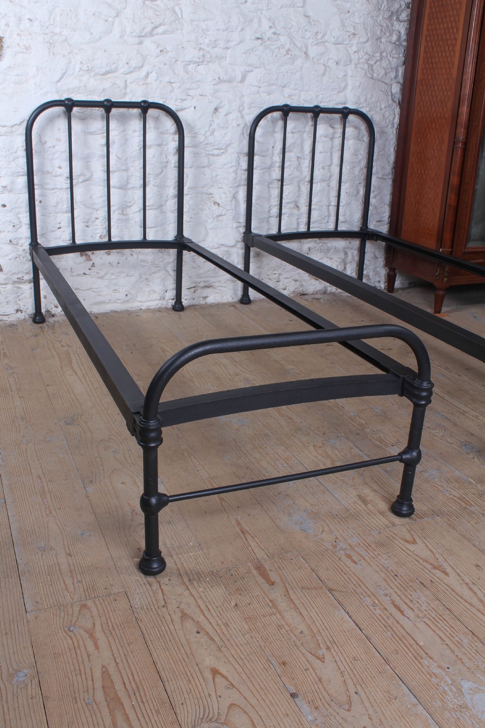 Lovely simple pair of small Utilitarain style beds  View IV