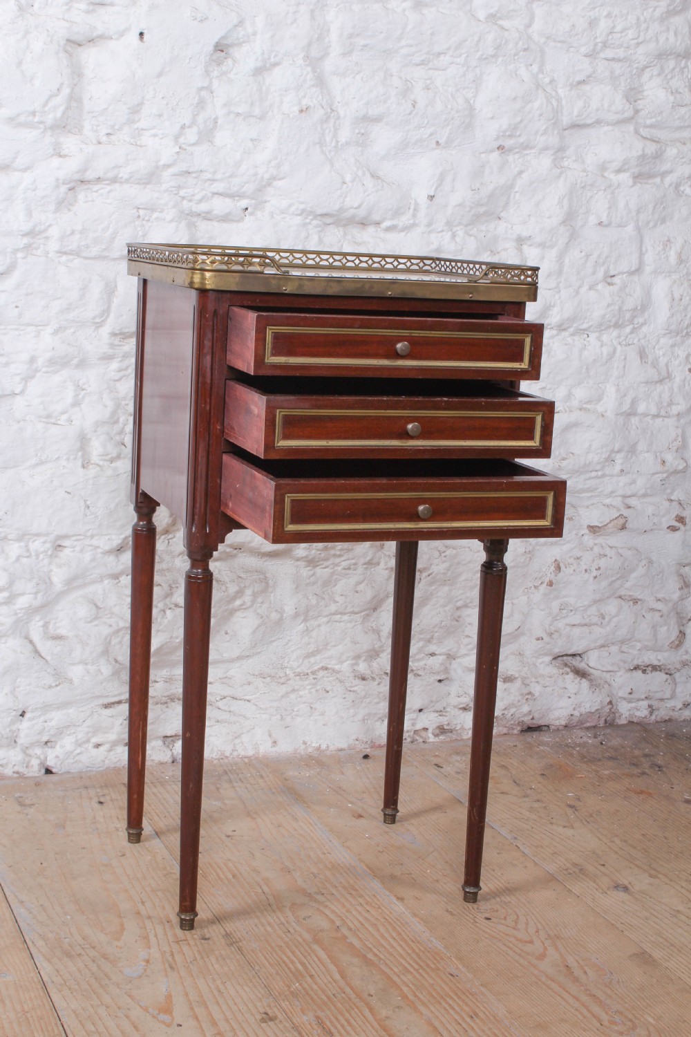 Very nice mahogany three drawer bedside View II