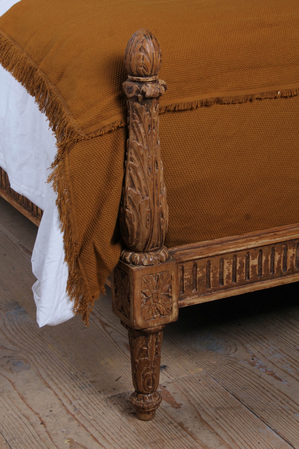 A Louis XVI style king size bed frame featuring a carved timber border, a striped upholstered arched headboard, and low carved corner posts. View VII