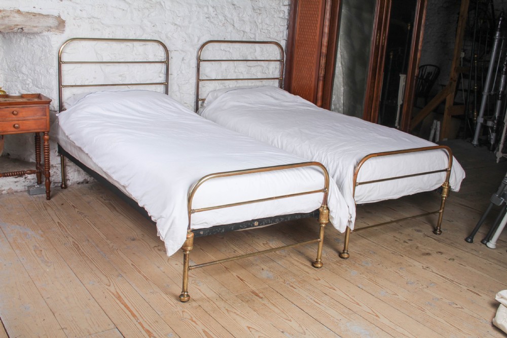 Lovely Pair of Heals and Sons brass Sigle Beds (Can be Joined) 