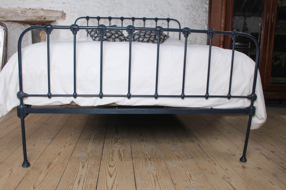 Rare and individual simple all iron king size bed with very unique decorative detail View II