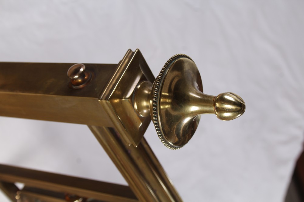 An antique French brass double bed frame with ornamental lattice headboard and footboard panels, vertical spindles, and finial corner posts. View XVIII