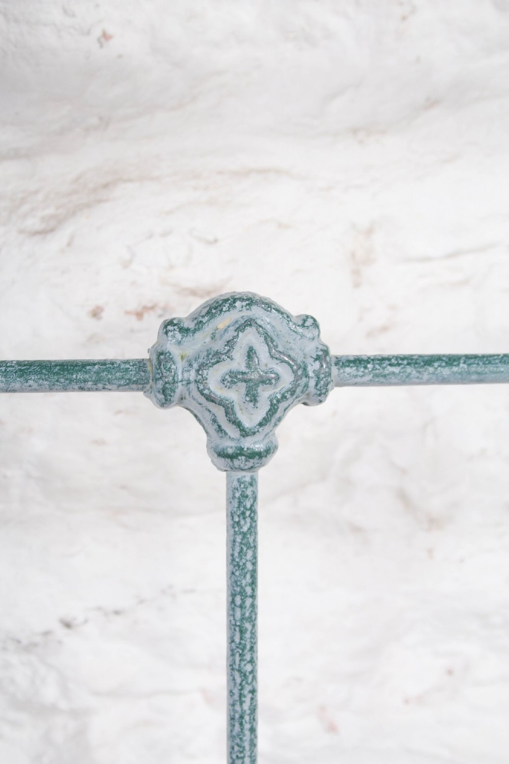 A Victorian king-size light blue painted iron bedstead featuring a straight brass top rail with polished brass corner finials. View IV