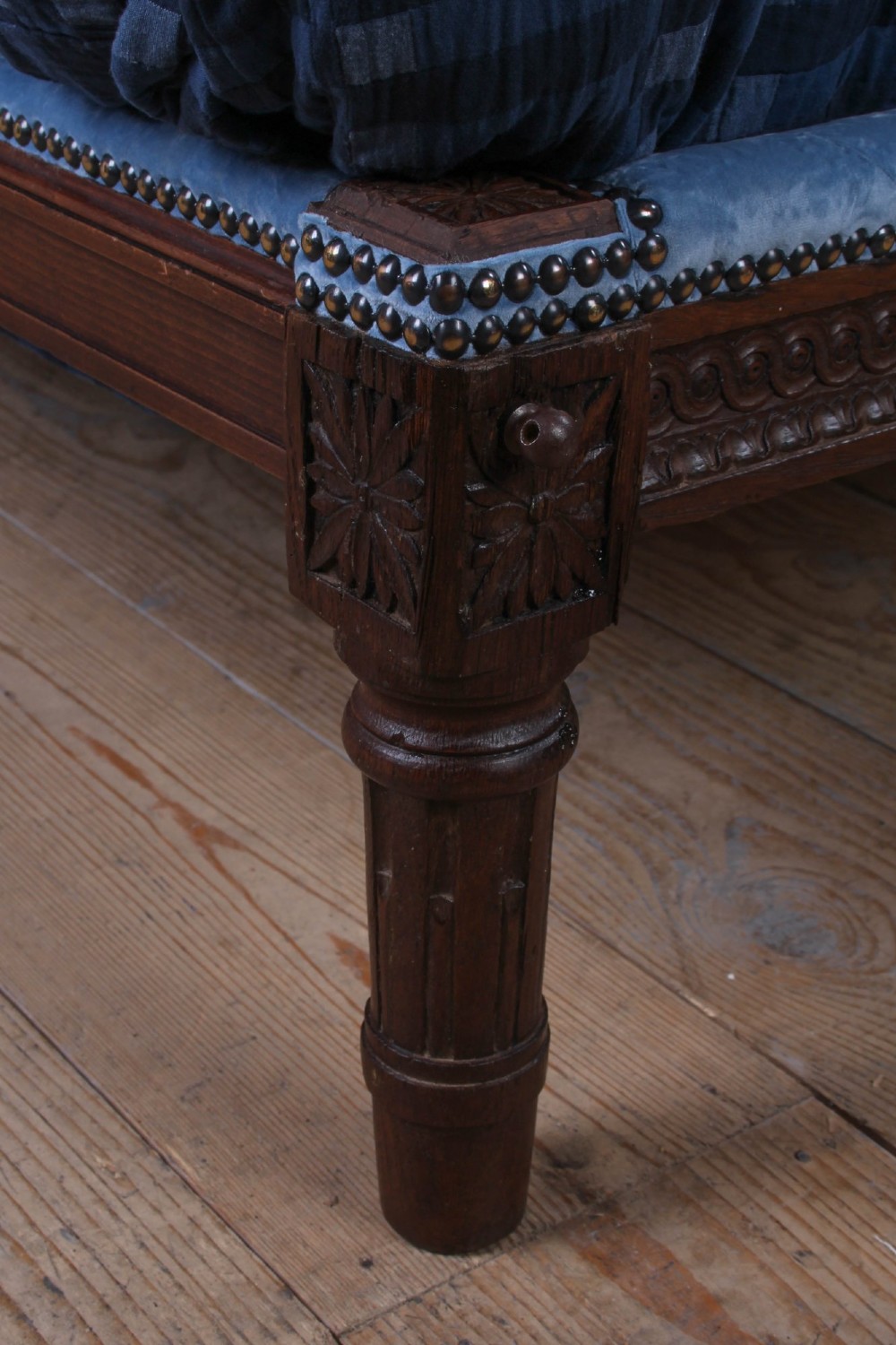 A Louis XVI style oak double bed frame featuring an arched headboard and low footboard upholstered in light blue fabric with trim details. View III