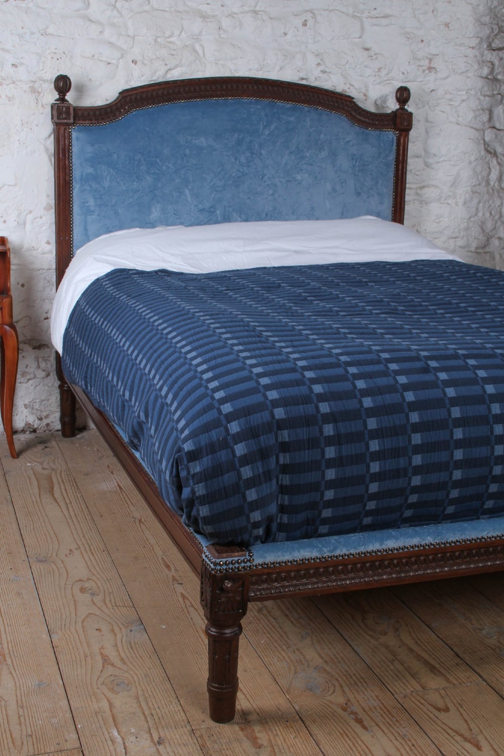 A Louis XVI style oak double bed frame featuring an arched headboard and low footboard upholstered in light blue fabric with trim details. View IV