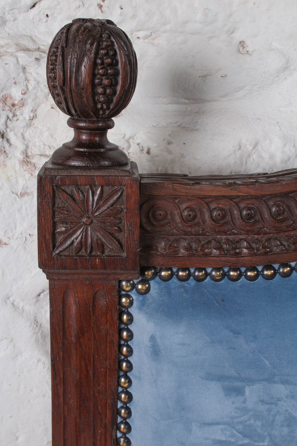 A Louis XVI style oak double bed frame featuring an arched headboard and low footboard upholstered in light blue fabric with trim details. View VI