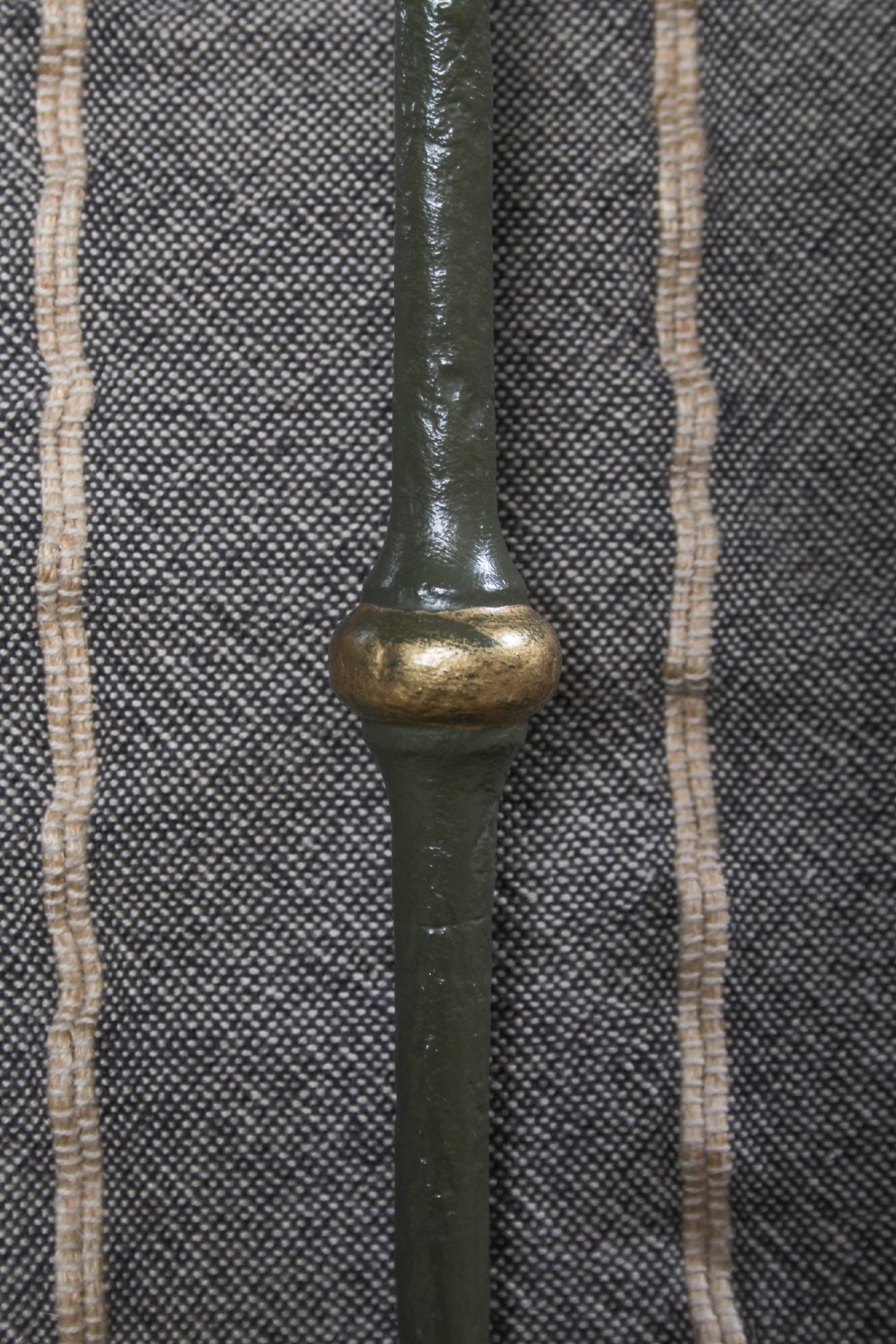 A dark green painted iron and brass king-size bedstead featuring vertical iron spindles and polished brass top rails. View IV