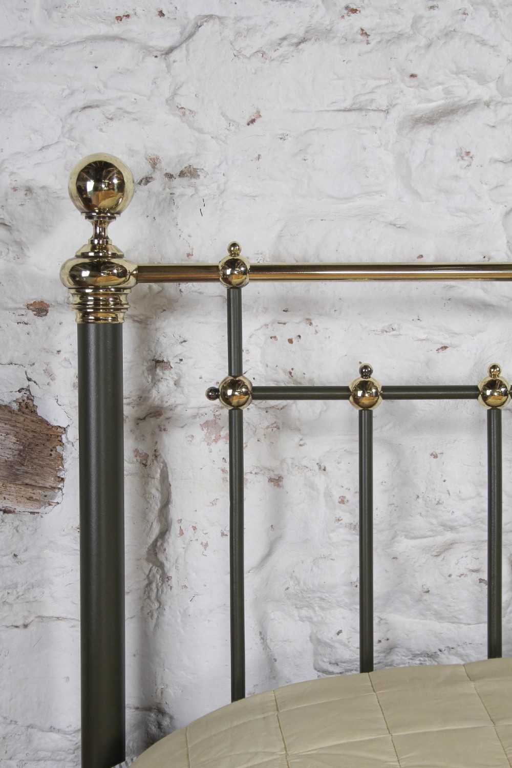 Victorian super-king size bedstead featuring dark green painted iron spindles and polished brass rails and finials. View VI