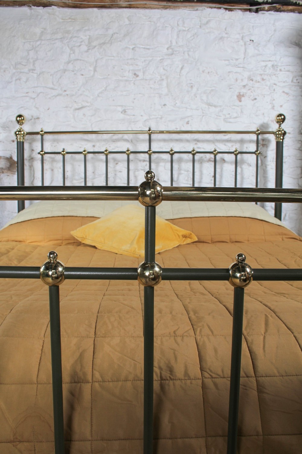 Victorian super-king size bedstead featuring dark green painted iron spindles and polished brass rails and finials. View VII