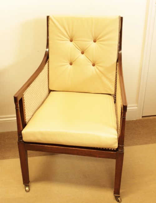 A Edwardain Mahogany Bergere Chair