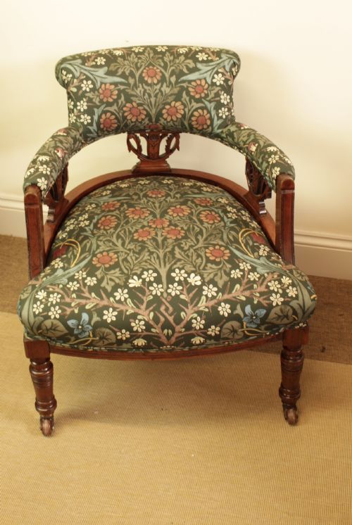 A Victorian Walnut Open Arm  Chair