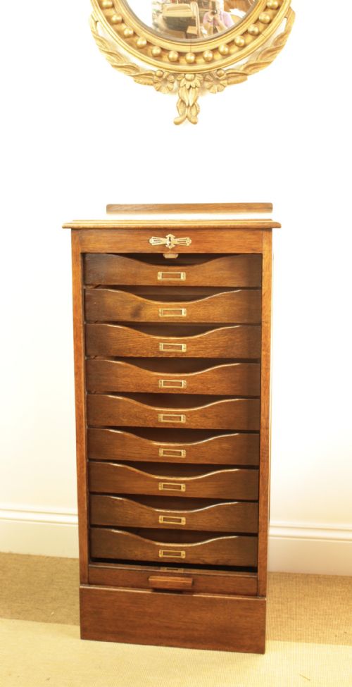 A Oak Tambour Filling Cabinet
