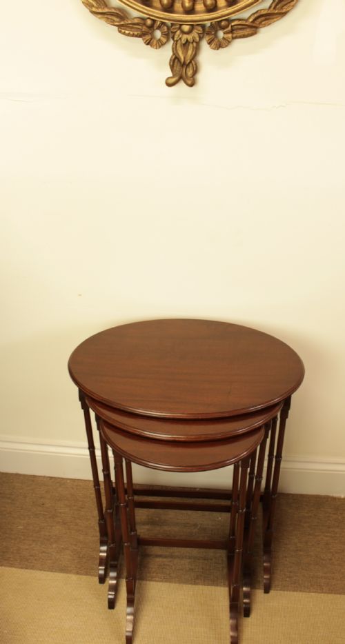 A Set of Three Mahogany Nest of Tables