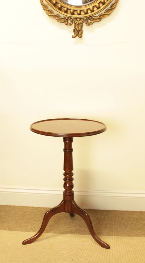 A Mahogany Wine Table with a Lip