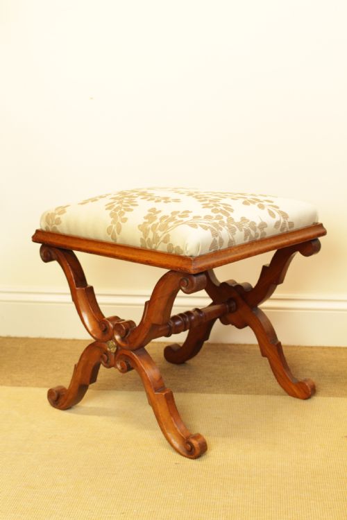 A Walnut X Frame Stool