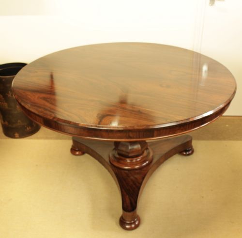 A Quailty Rosewood Tilt Top Table