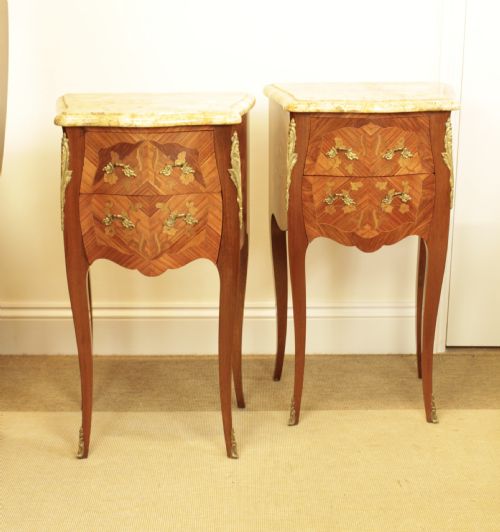 A Pair of French Marquetry Marble Top Bedside Tables