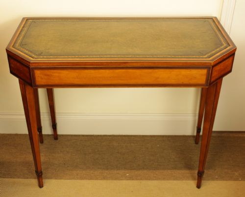 A Regency Satinwood and Rosewood Games Table