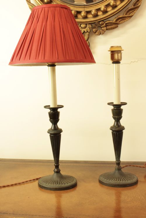 A Pair of Bronze Adams Style Candlestick Table Lamps