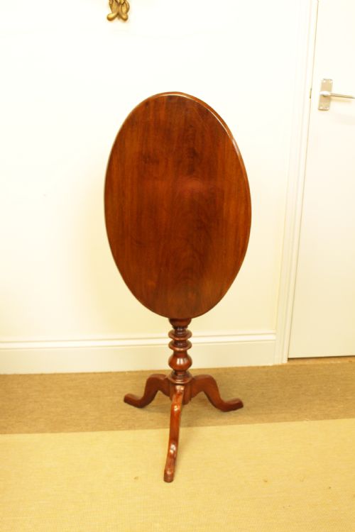 A 19th Century Solid Mahogany Oval Tilt Top Table