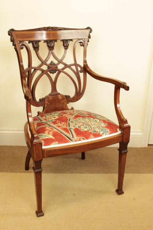 A Edwardain Mahogany Carved & Inlaid Open Arm Chair