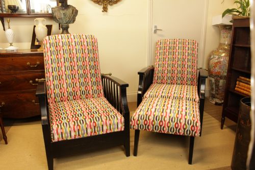 A Pair of 1920'S Ebony Adjustable Reclining Chairs