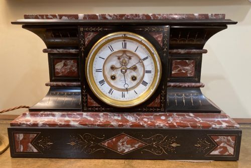 A Striking 19th C. French Marble Clock