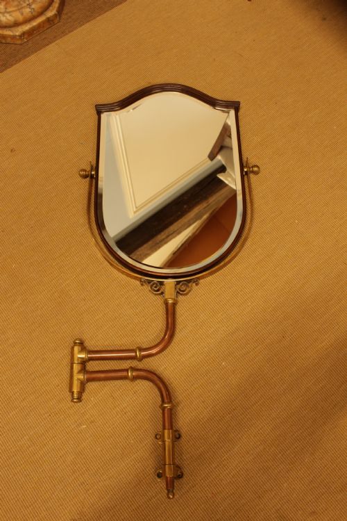A QUALITY MAHOGANY SHIELD MIRROR WITH COPPER BRASS FITTING - ADDITIONAL PHOTO 1