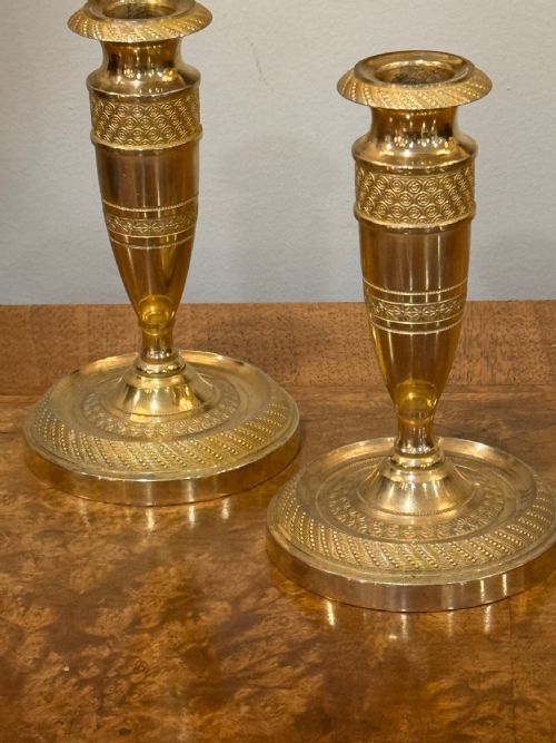A Pair of Ormolu Candle Sticks