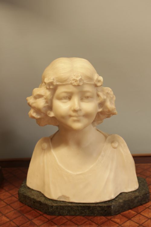 A French Arts & Crafts Bust of a Young Lady