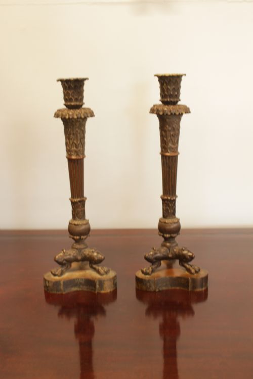A Pair of Bronze Candlesticks