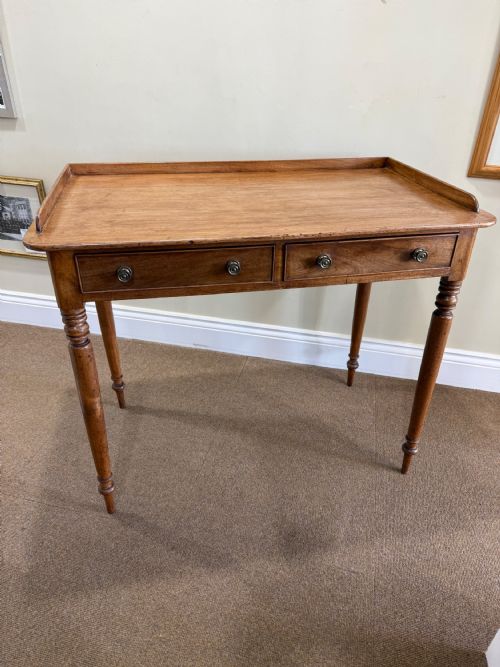 A Mahogany Two Drawer Dressing Table