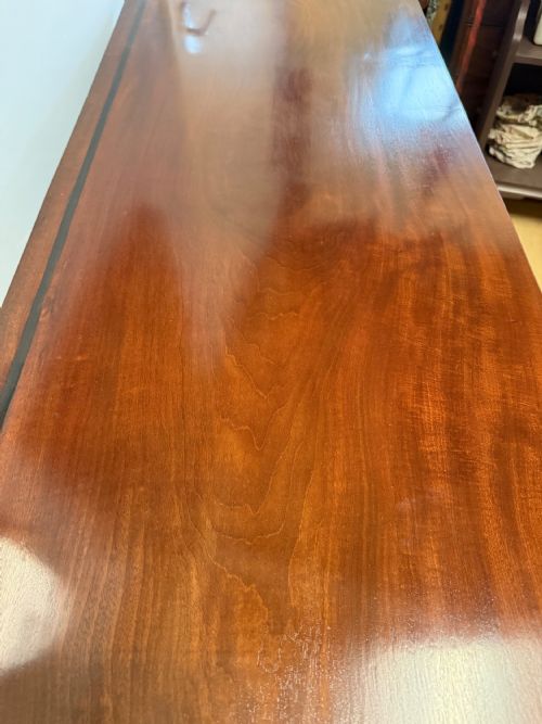 A FINE REGENCY MAHOGANY SIDEBOARD WITH EBONY INLAY - ADDITIONAL PHOTO 1