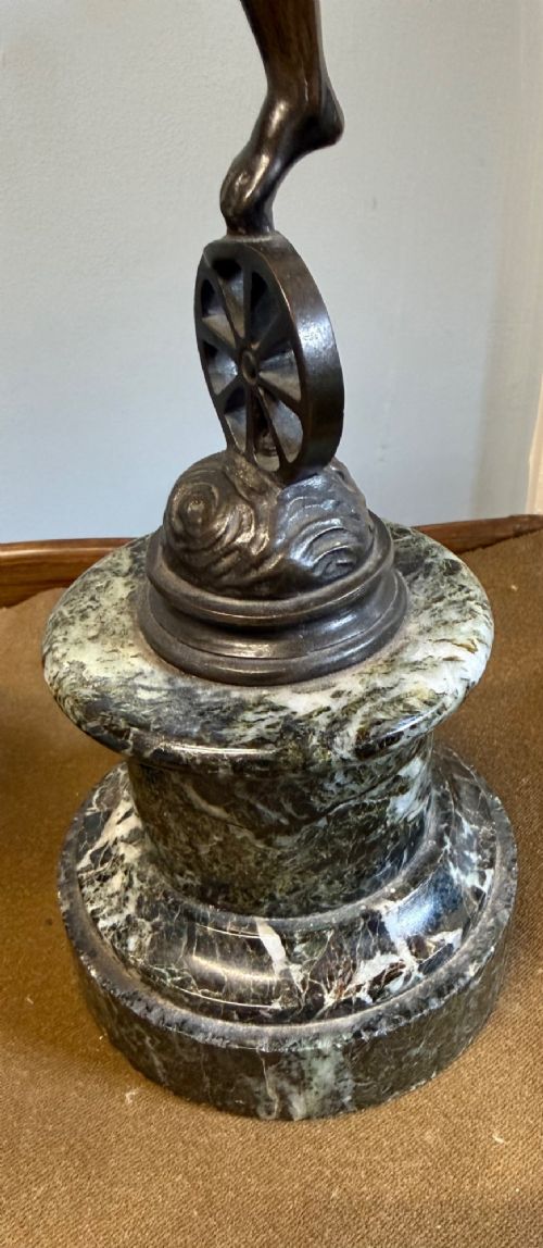 A pair of dark bronze Neoclassical figures depicting Mercury and Fortuna mounted on cylindrical green marble pedestals. View V