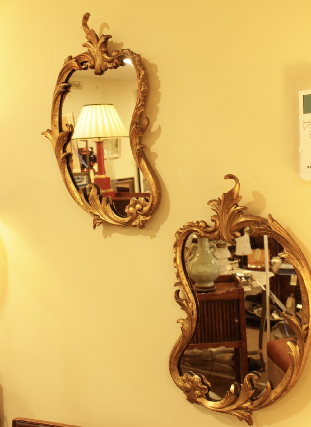 A Pair Of Kidney Shape Gilt Mirrors
