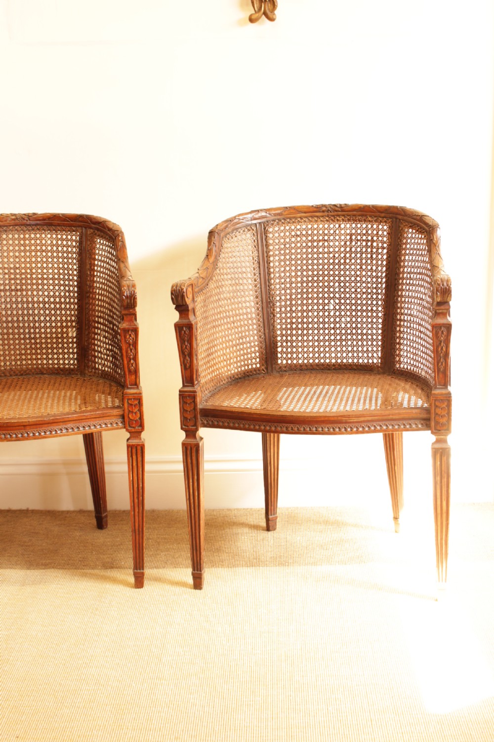 A Pair of Walnut Canned Arm Chairs View III
