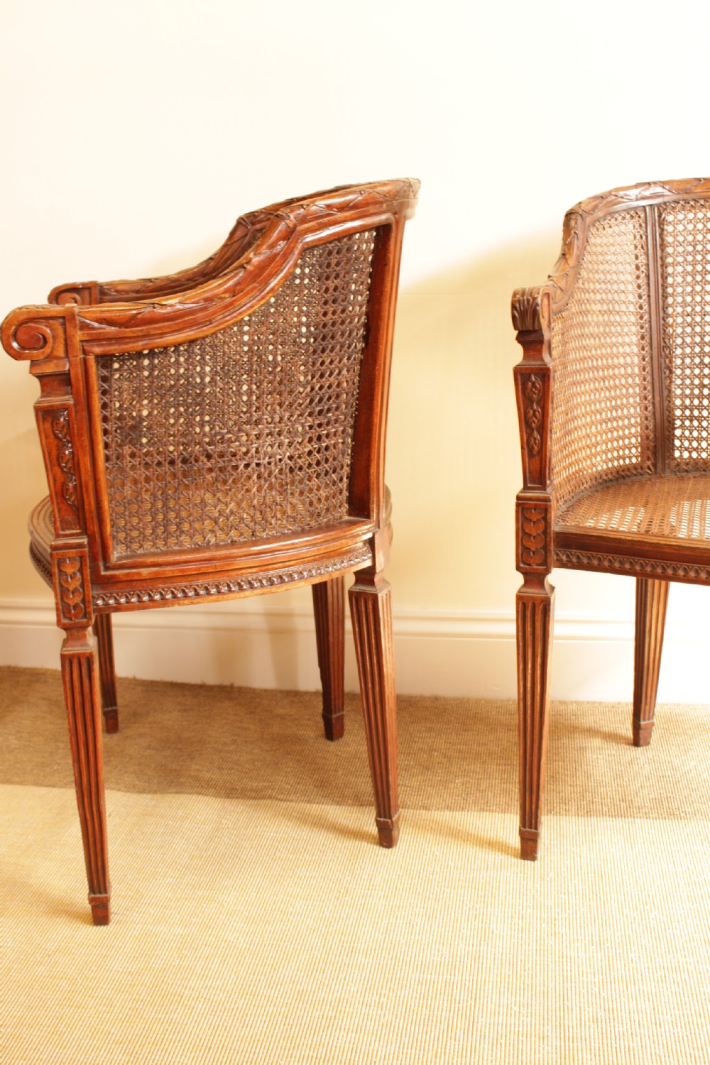 A Pair of Walnut Canned Arm Chairs View VI