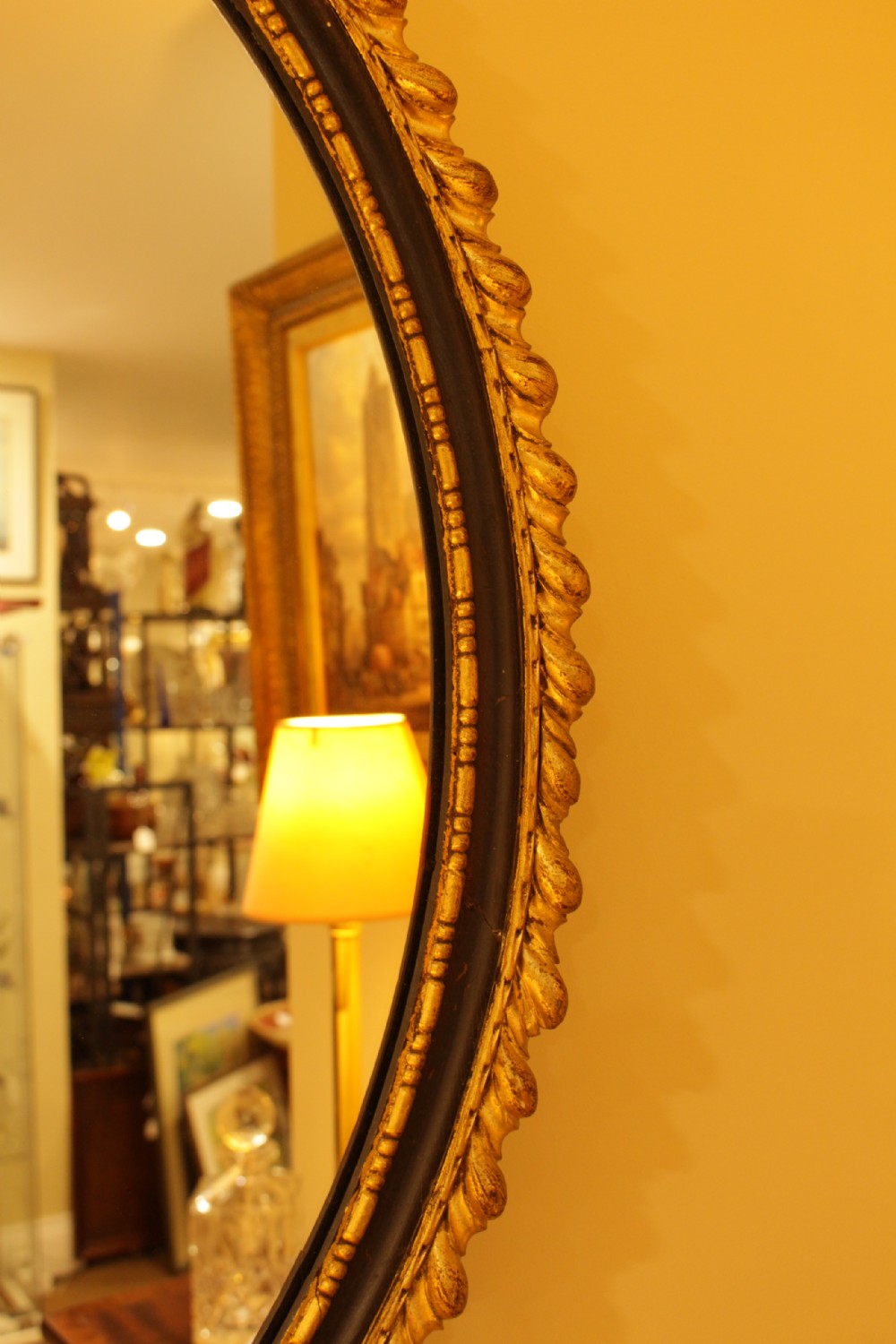 A 19th C. Oval Gilt & Ebonised Mirror View II