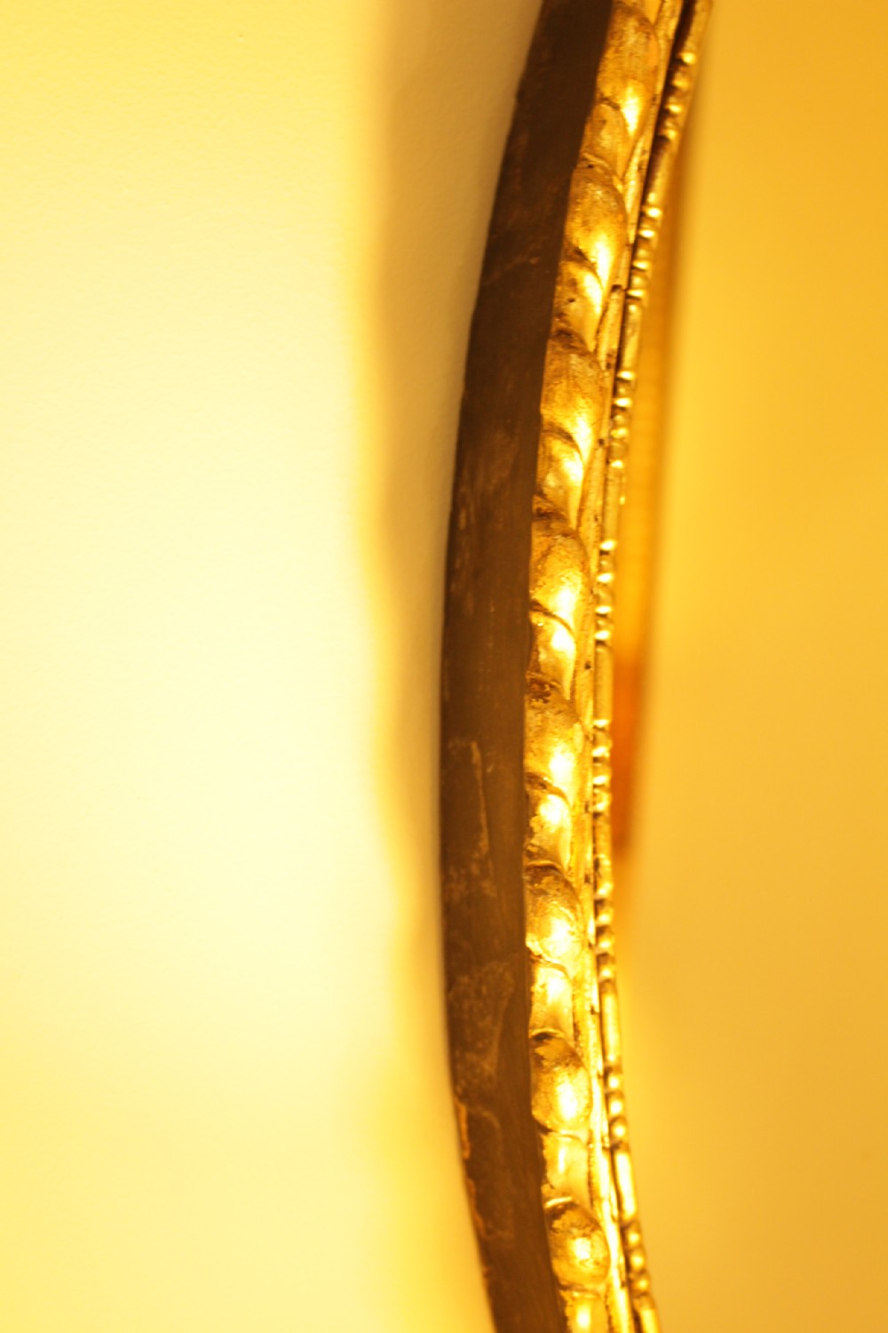 A 19th C. Oval Gilt & Ebonised Mirror View VI