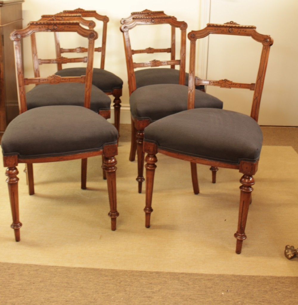 A Set Of Six Walnut Chairs
