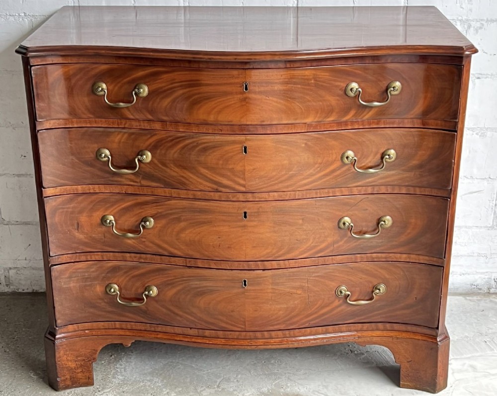 A Georgian Mahogany Serpintine Chest 