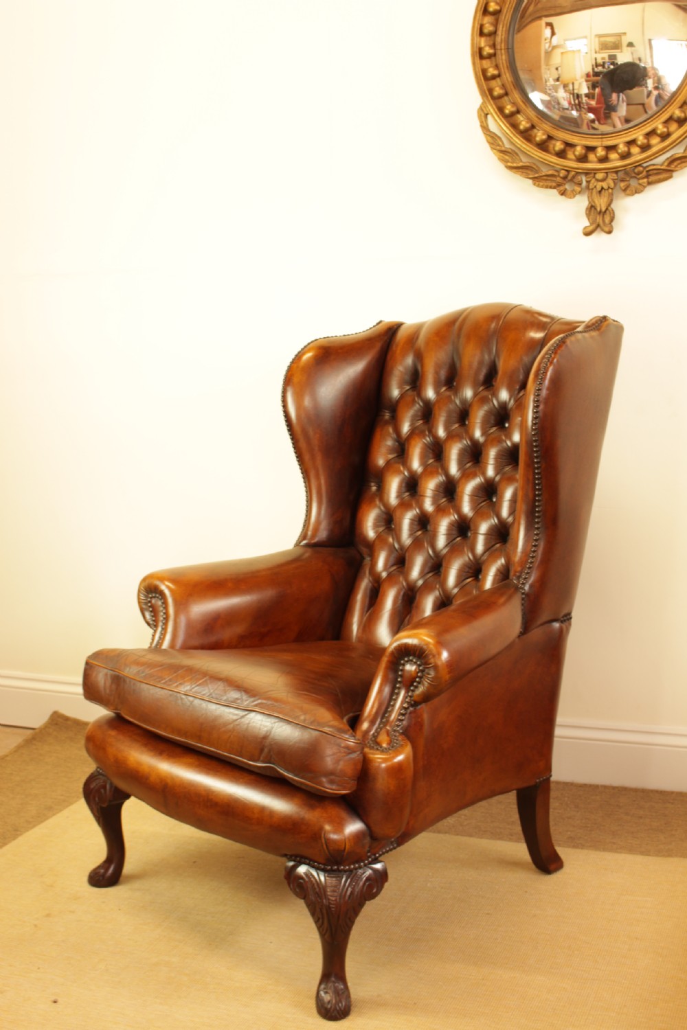 A Button Back Leather Wing Arm Chair  View III
