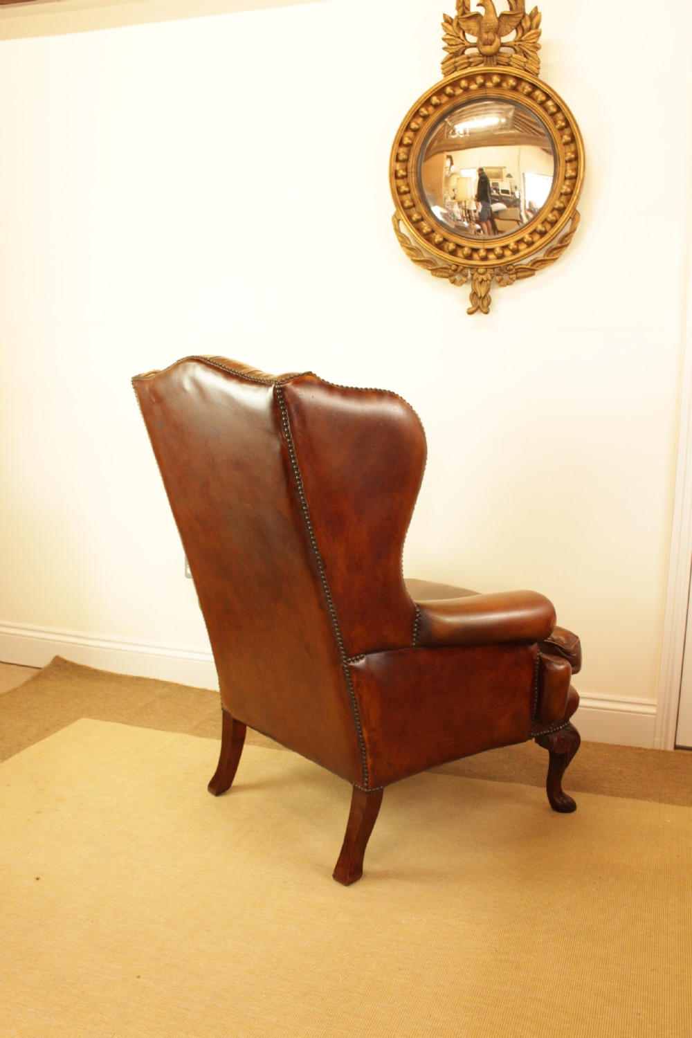A Button Back Leather Wing Arm Chair  View VII