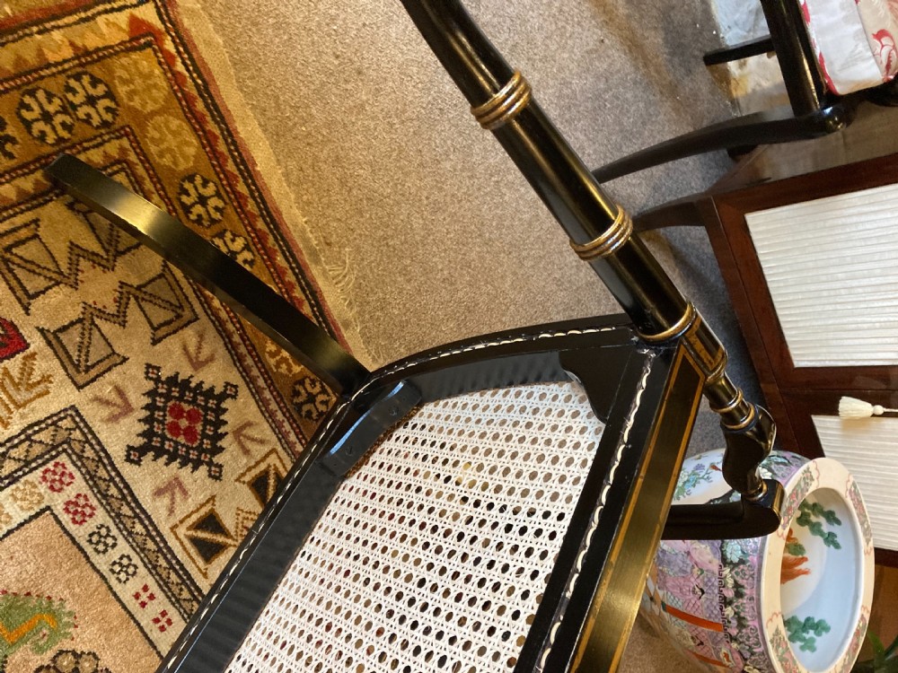 A Ebonised Two Seater Cane Sofa  View IV