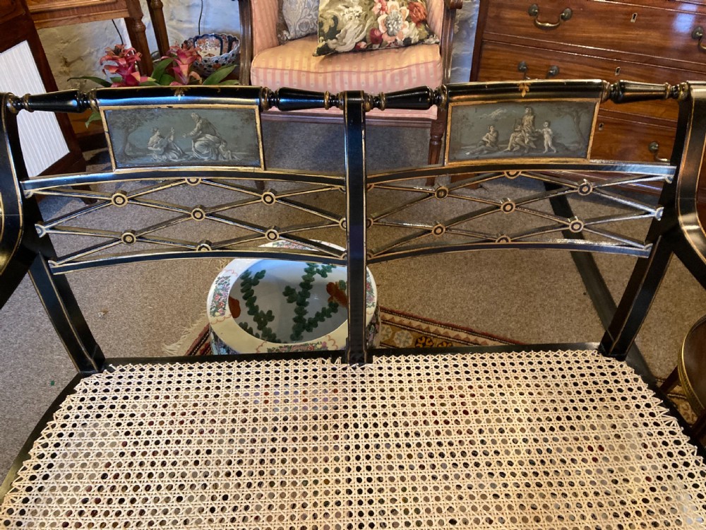 A Ebonised Two Seater Cane Sofa  View VI
