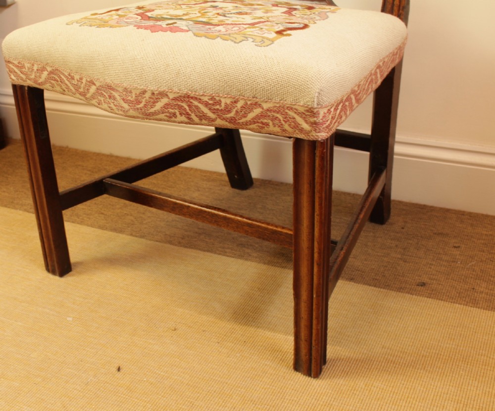 An 18th-century Chippendale-style carved mahogany side chair featuring a pierced back splat and a cream needlepoint tapestry seat. View III