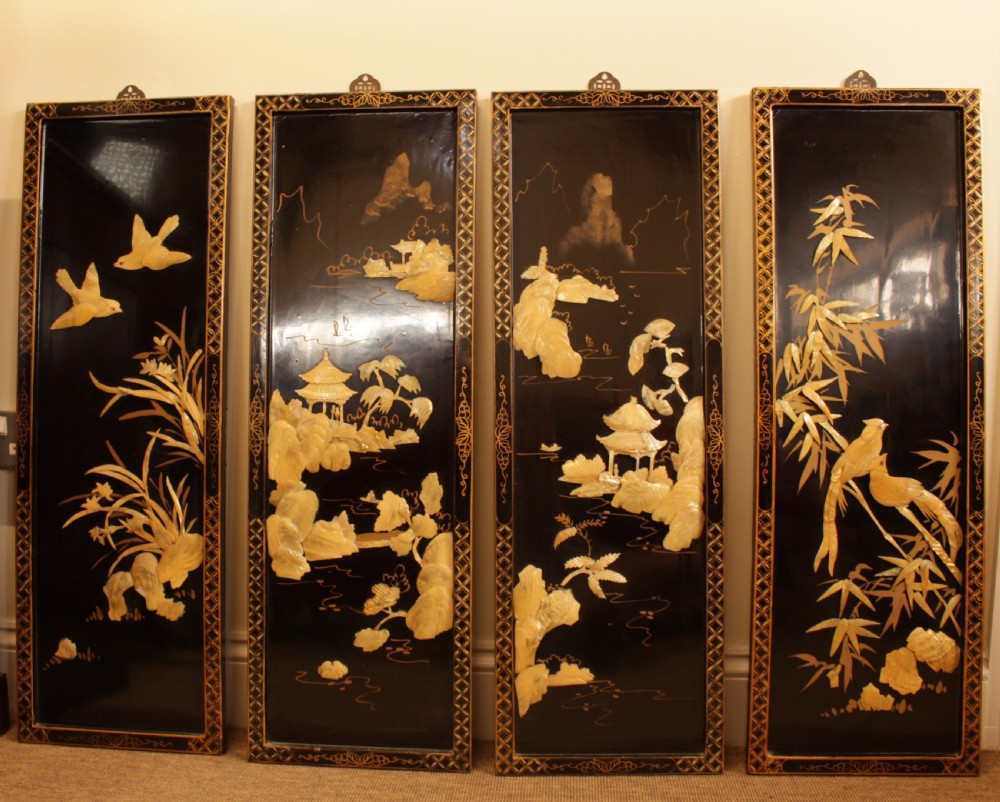 A Set Of Four Mother Of Pearl Oriental Wall Plaques
