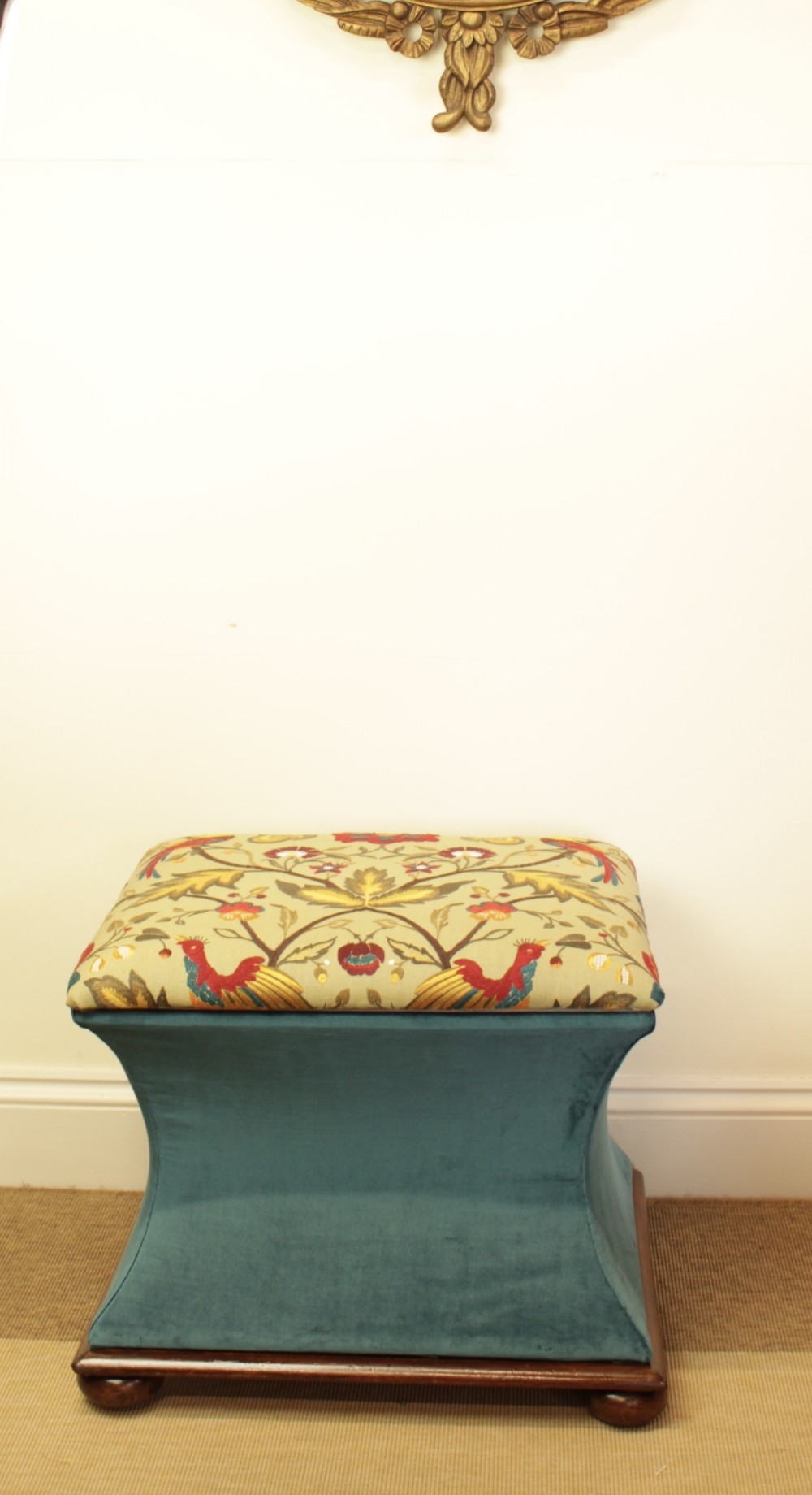 A Mahogany Waisted Ottoman 