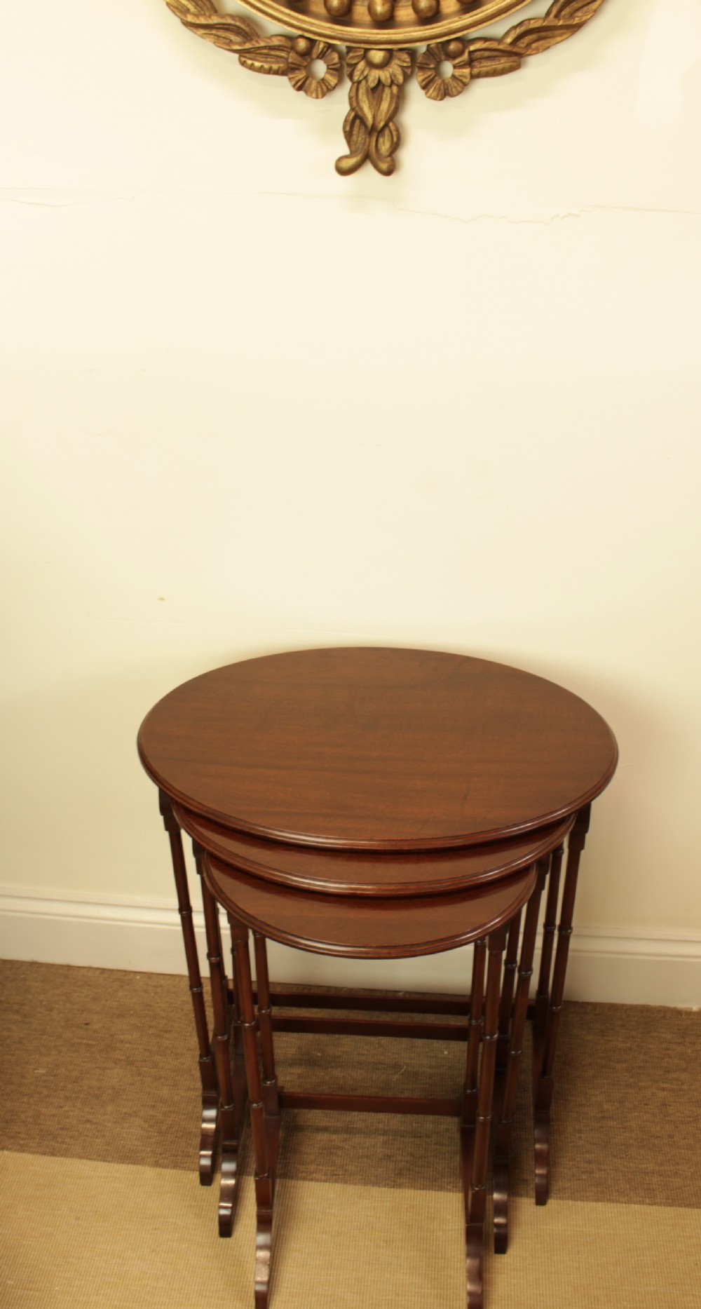 A Set Of Three Mahogany Nest Of Tables